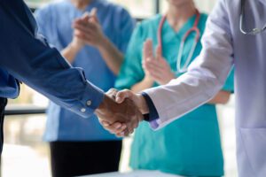 Accreditation Consulting Handshake